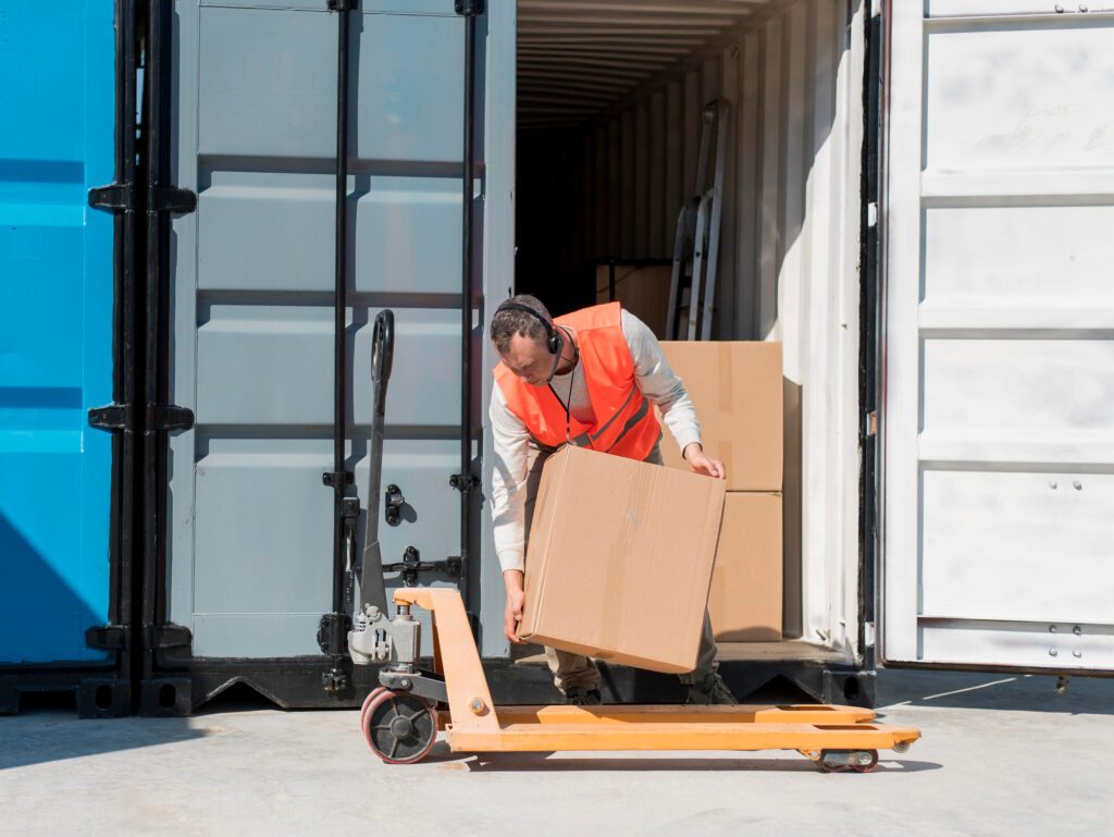 worker loading freight pallets in warehouse for shifted freight reno service